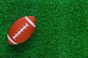 American football background with football ball.